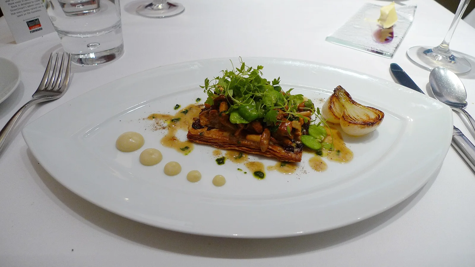 My tart fine of girolles (that's mushrooms), with broad beans, grelot onions and chervil purée. At Pied à Terre , Charlotte Street.