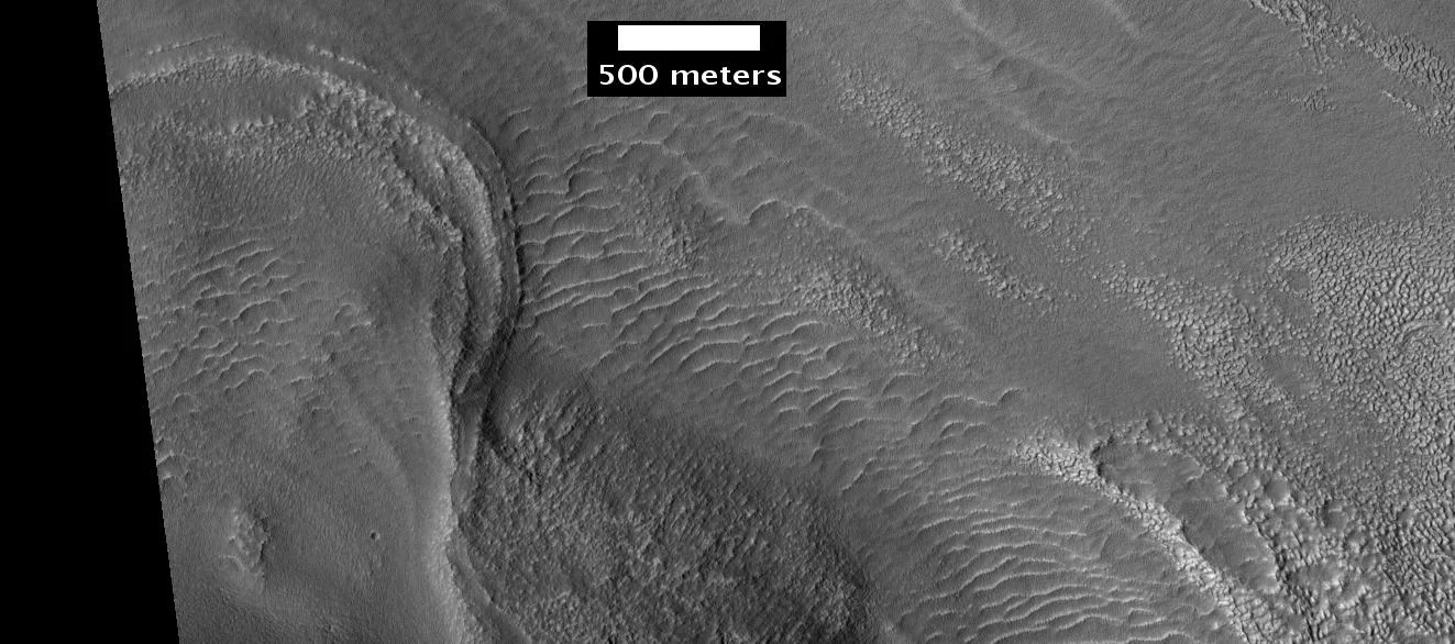 End of possible glacier from mound in Deuteronilus Mensae, as seen by hirise, under the HiWish program. Location is 44.2 N and 37.8 E.