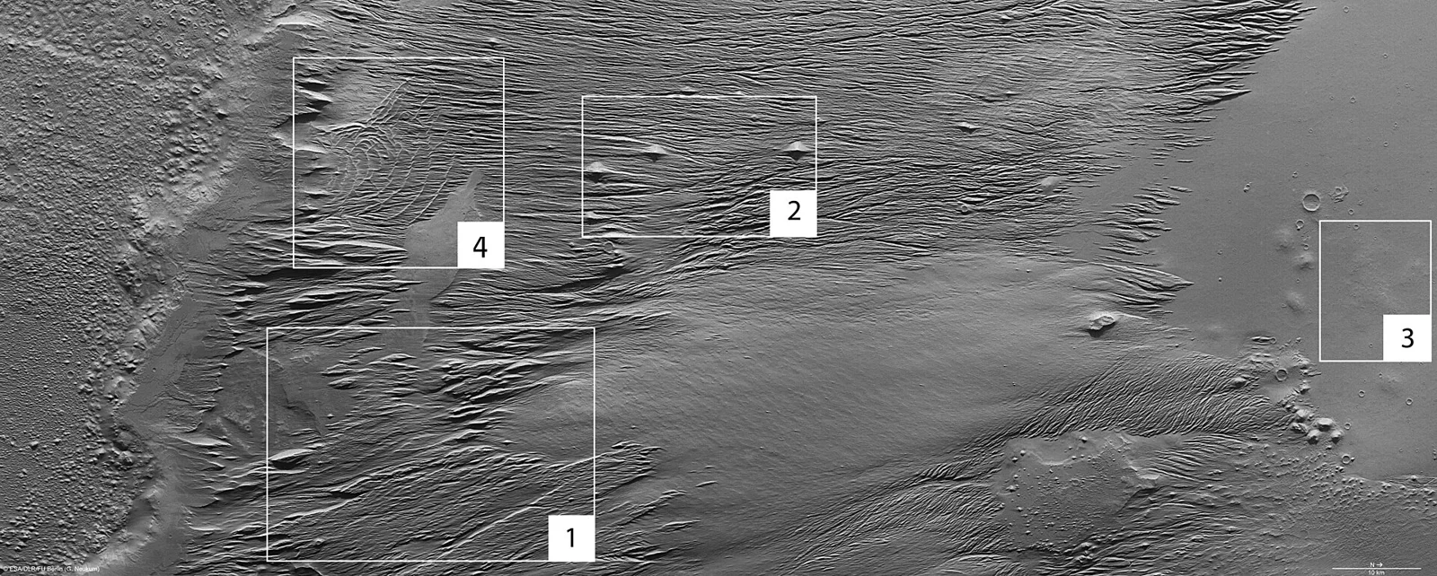 The region exhibits several kilometre-long linear structures interspersed with channels. The entire area bears evidence of the erosional for