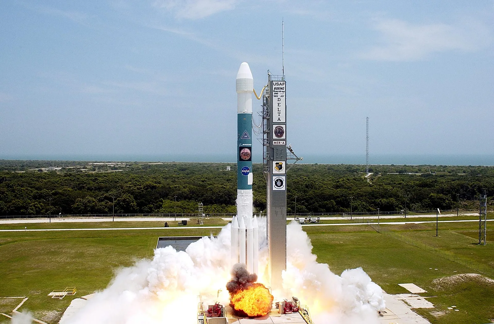 KENNEDY SPACE CENTER, FLA. - With a glimpse of the Atlantic Ocean over the horizon, the Delta II rocket with its Mars Exploration Rover (MER