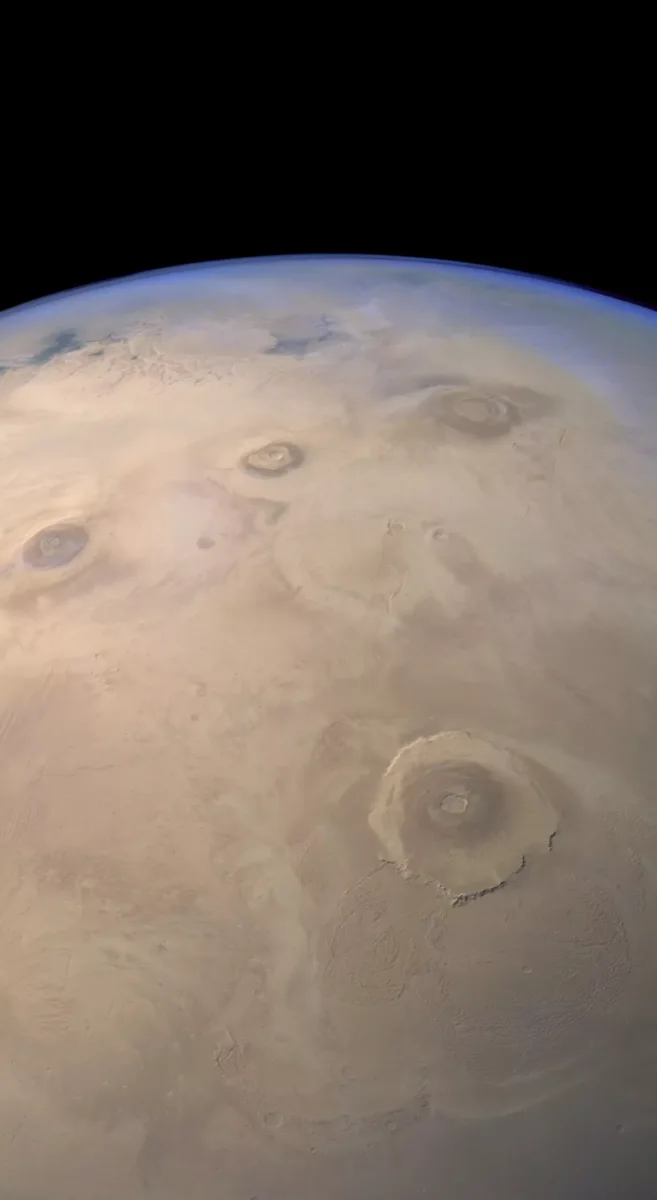 The Mars Express High Resolution Stereo Camera (HRSC) captured this view of Mars' Tharsis volcanic region on June 29, 2014 during its 13,323