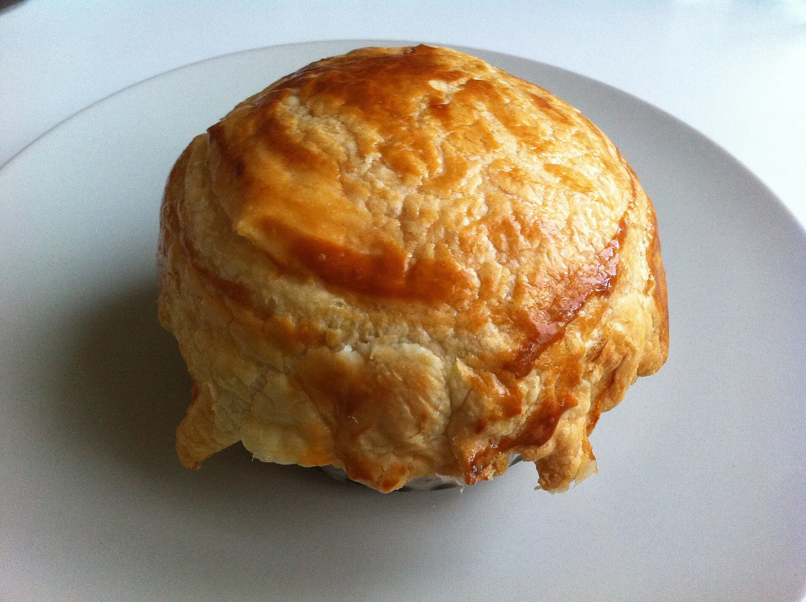 A pastry with mushrooms straight from the oven
