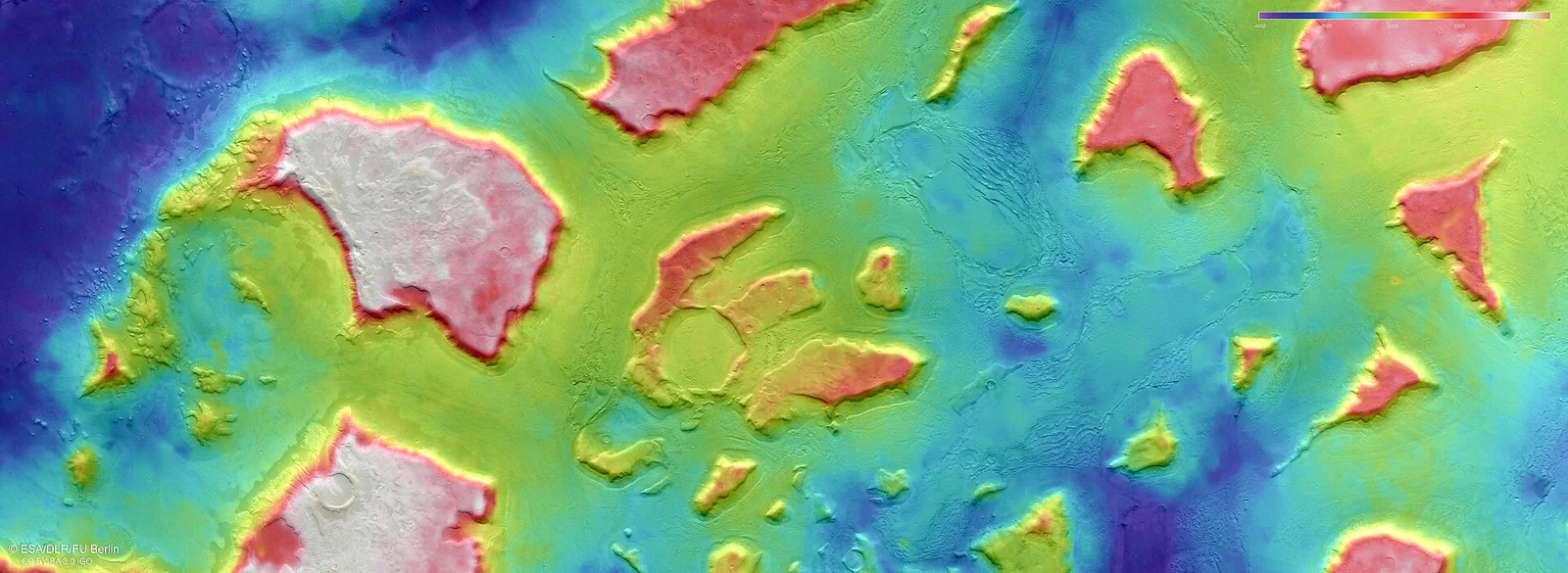 This colour-coded topographic view shows a region of Mars named Deuteronilus Mensae. Lower parts of the surface are shown in blues and purpl